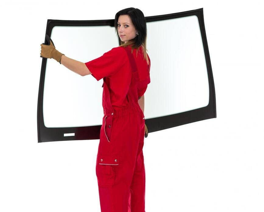 woman holding a new windshield